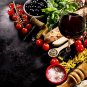 Tasty fresh appetizing italian food ingredients on dark backgrou Italian Food & Wine